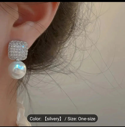 1 Pair of Luxury Women's Earrings.