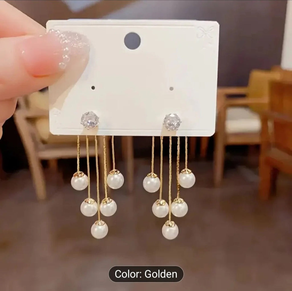 1 Pair of Luxury Women's Earrings.